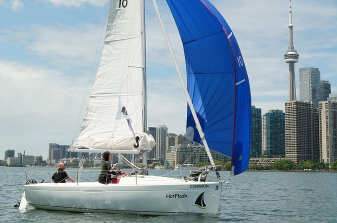 3hr Shared Sailing Adventure - Steering the yacht or relaxing on foredeck beanbags