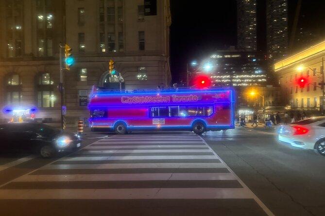 City Sightseeing Toronto Guided Night Bus Tour - Rogers Centre and the Financial District: two kinds of nighttime glow