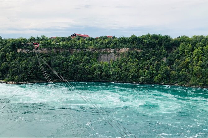 Epic Niagara Falls Private Tour w/ Tower, Journey & Boat Cruise - Journey Behind the Falls: seeing the Horseshoe Falls from tunnels