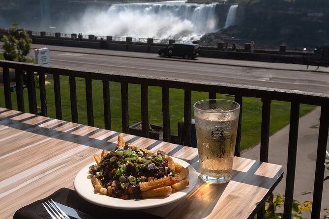 Niagara Falls All Canadian Food Walking Tour - Queen Victoria Place: Montreal Smoked Meat Poutine and the Drink Included