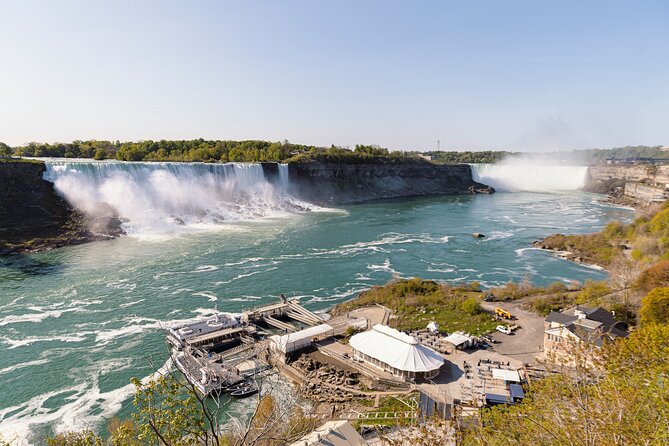 Niagara Falls Boat Ride VIP Boarding & Journey Behind the Falls - Guided boardwalk walk after the cruise: where the story clicks