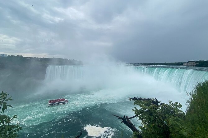 Niagara Falls Day Tour Includes Boat Cruise, Winery Stop & Lunch - Table Rock Welcome Centre: mist, photos, and quick shopping time