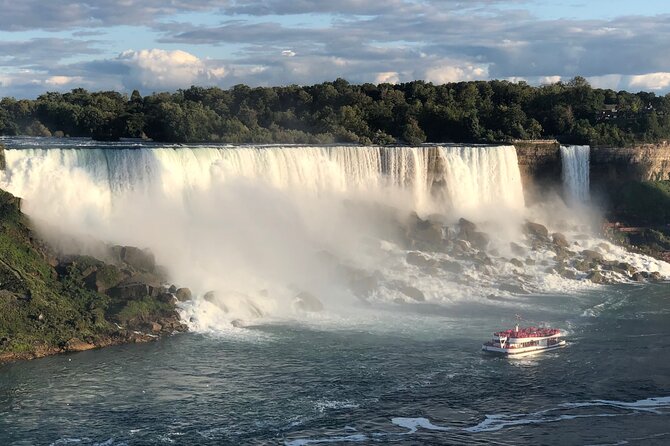 Niagara Falls Small Group Tour w/ Tower, Journey & Boat Cruise - Tesla, hydro power, and the Floral Clock: quick stops with smart meaning
