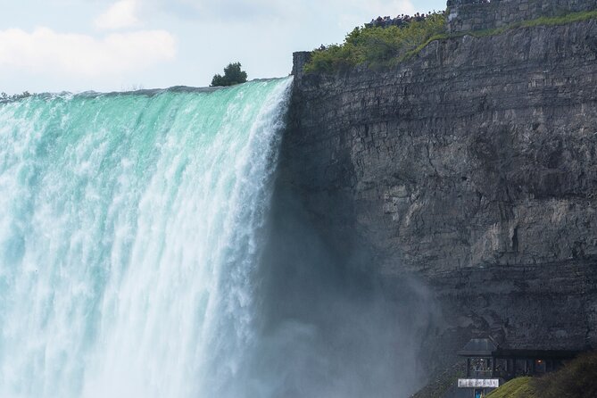 Niagara Falls Tour from Toronto: Boat Ride & Journey Behind Falls - Niagara Parkway stops: Floral Clock, hydro stations, Whirlpool (photo only)