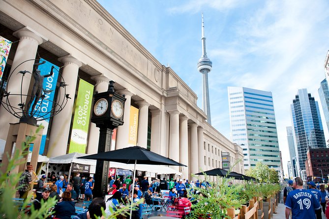 Show me the City! A Small Group Walking Tour of Toronto - Old Toronto street time: Flat Iron Building and Berczy Park