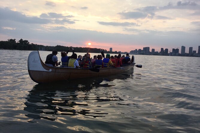Sunset Canoe Tour of the Toronto Islands - Boarding a Voyageur Canoe and Getting Ready to Paddle