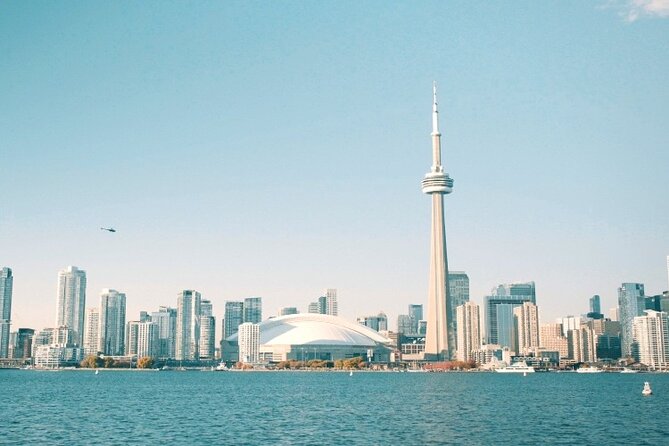 Toronto Highlights Small Group Tour with CN Tower - Waterfront cruise in summer, Casa Loma off-season