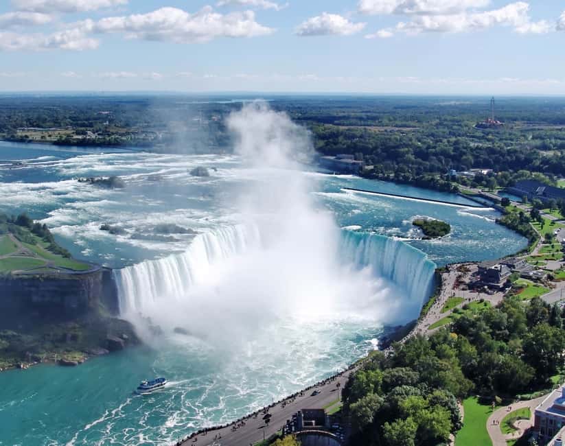 Toronto: Niagara Falls & NOTL Heritage Town Guided Day Tour - Niagara Whirlpool Photo Stop and Floral Clock Repeatability