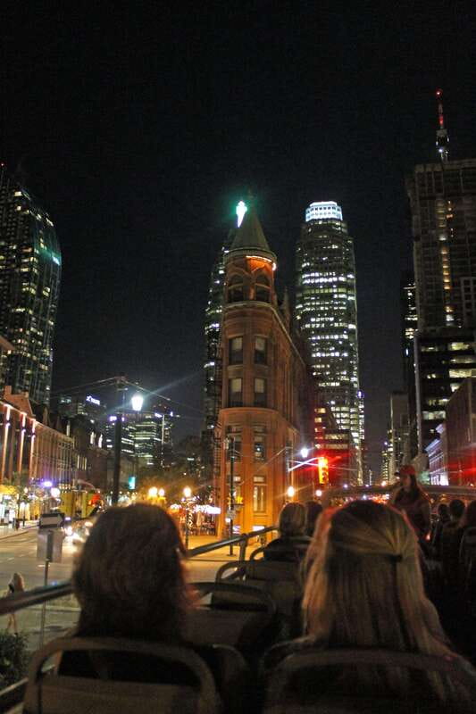 Toronto: Night Sightseeing Tour on a Double-Decker Bus - Live guides: facts, local context, and a smoother ride