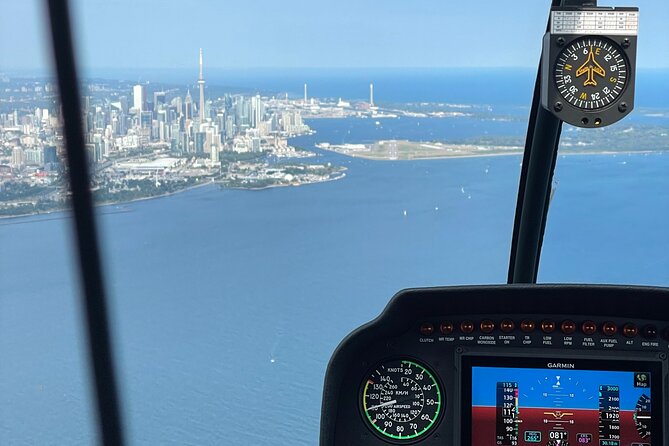 Toronto Skyline Helicopter Tour CN Tower Loop - Rogers Centre from above: worth it even when the dome timing is unknown