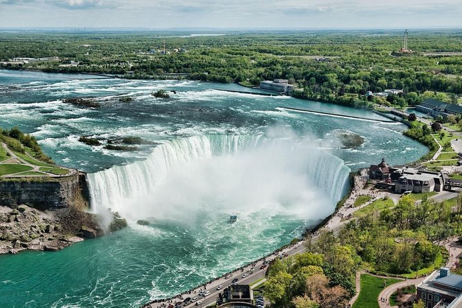 Toronto to Niagara Falls Tour with Skywheel & Fallsview Dinner - Floral Clock and small garden wonder: a fun breather